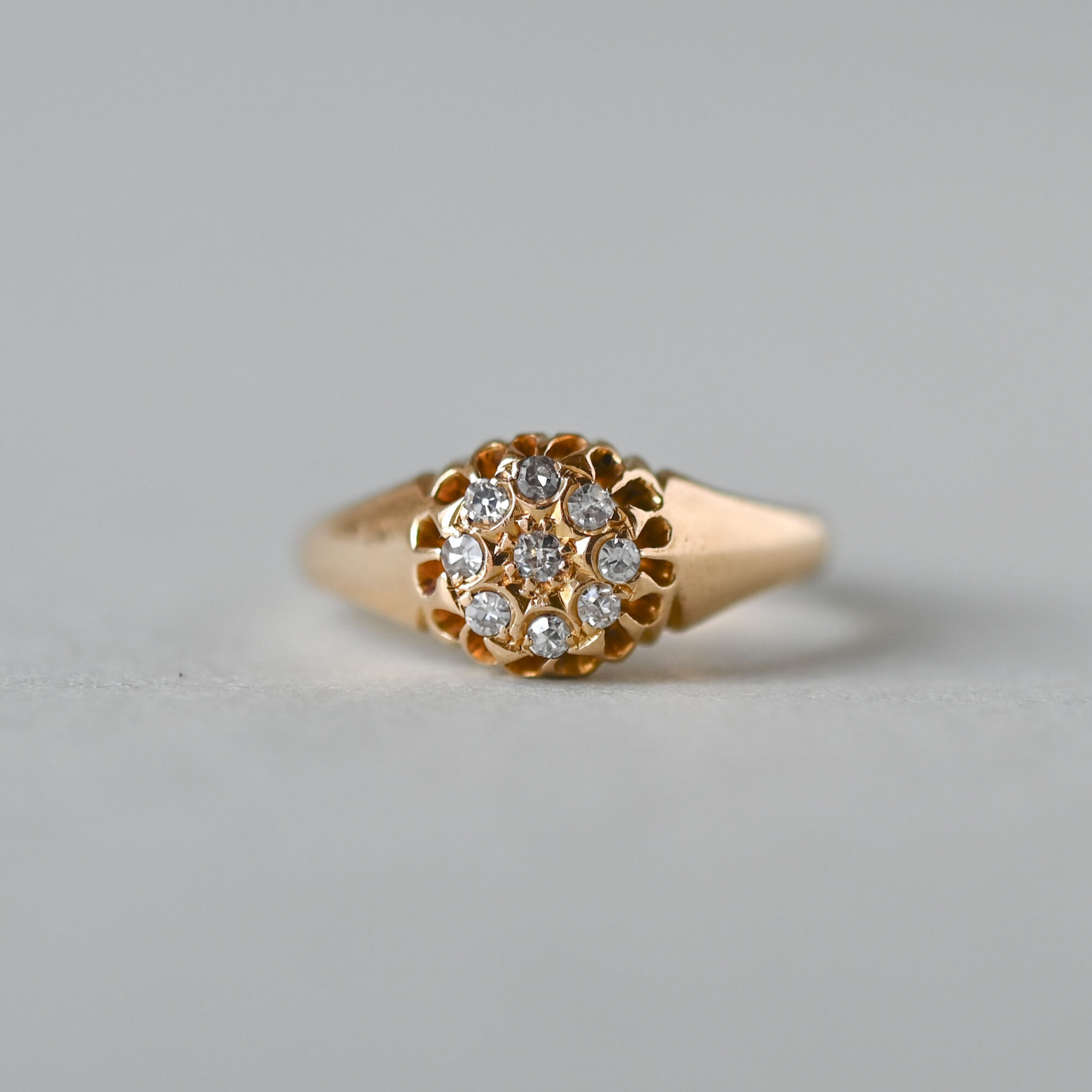 Antique 18ct gold diamond starburst cluster ring