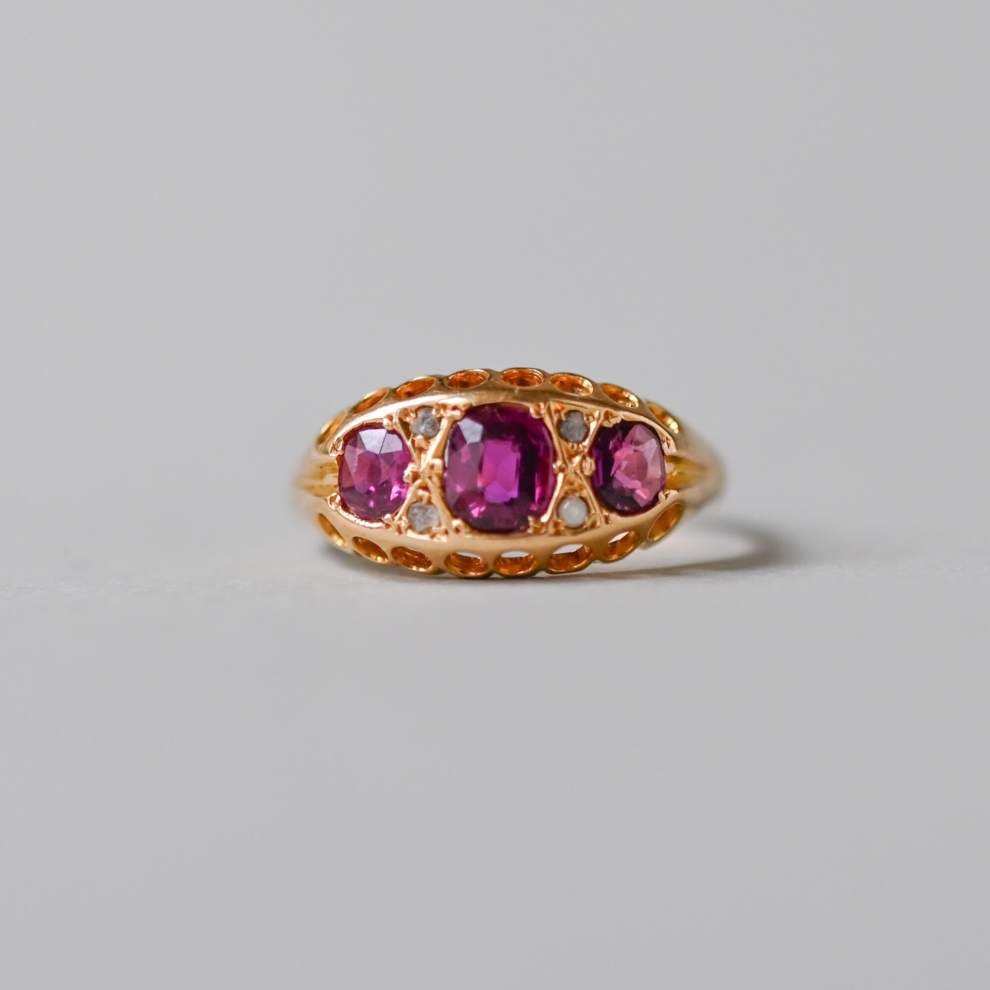 Antique Edwardian 18ct gold cushion cut ruby and mini diamond ring