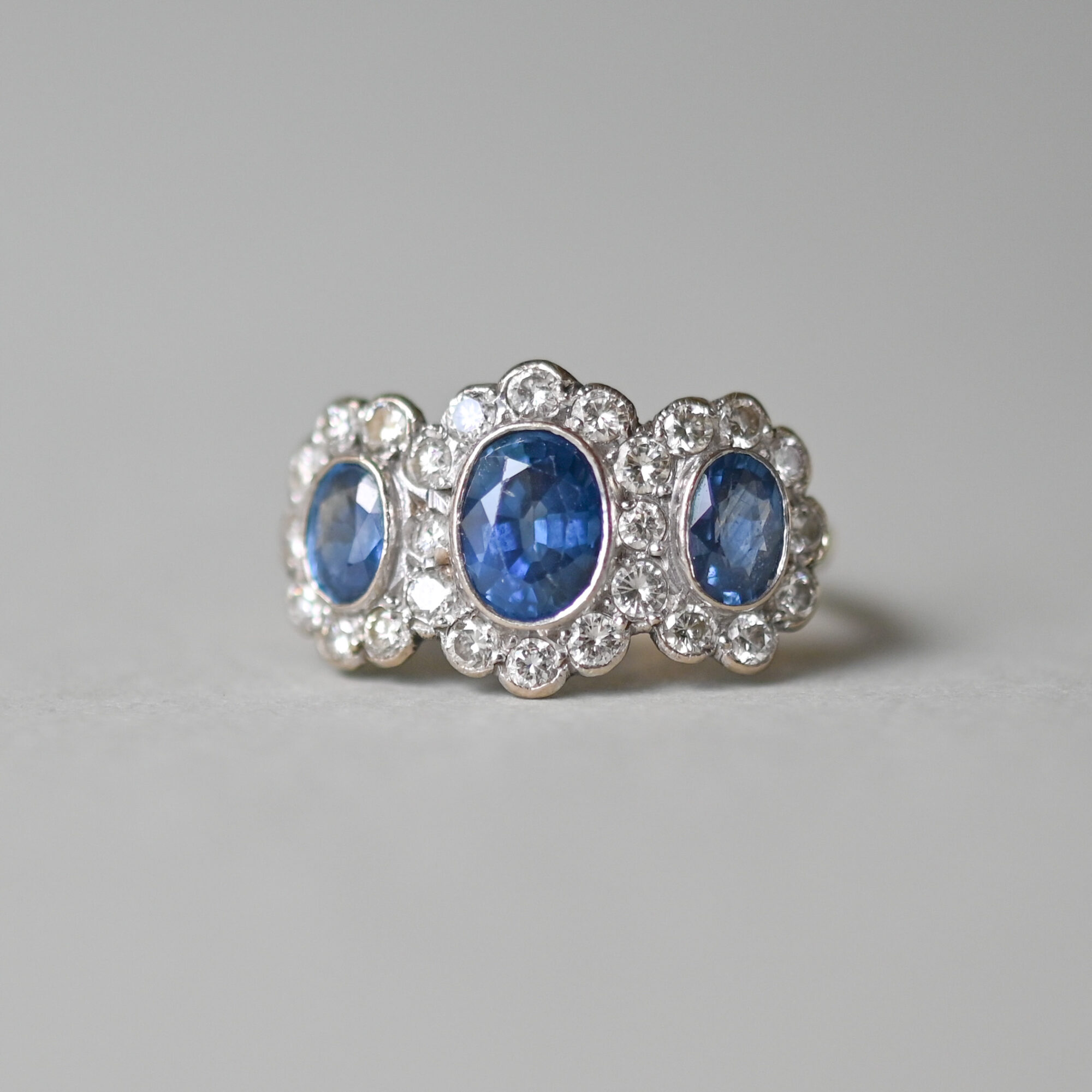 Classic 18ct gold 2.50 carat sapphire and diamond triple cluster ring