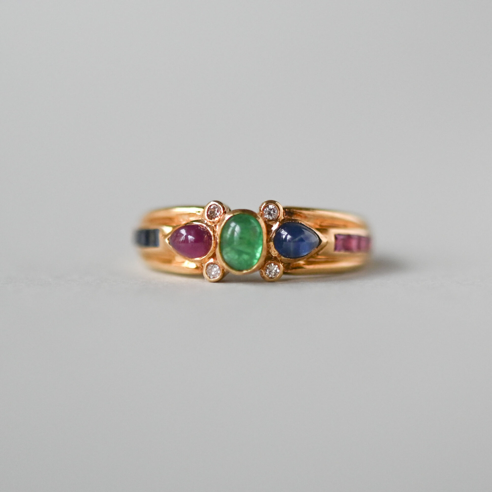 Contemporary 18ct gold emerald, sapphire and ruby aesthetic ring