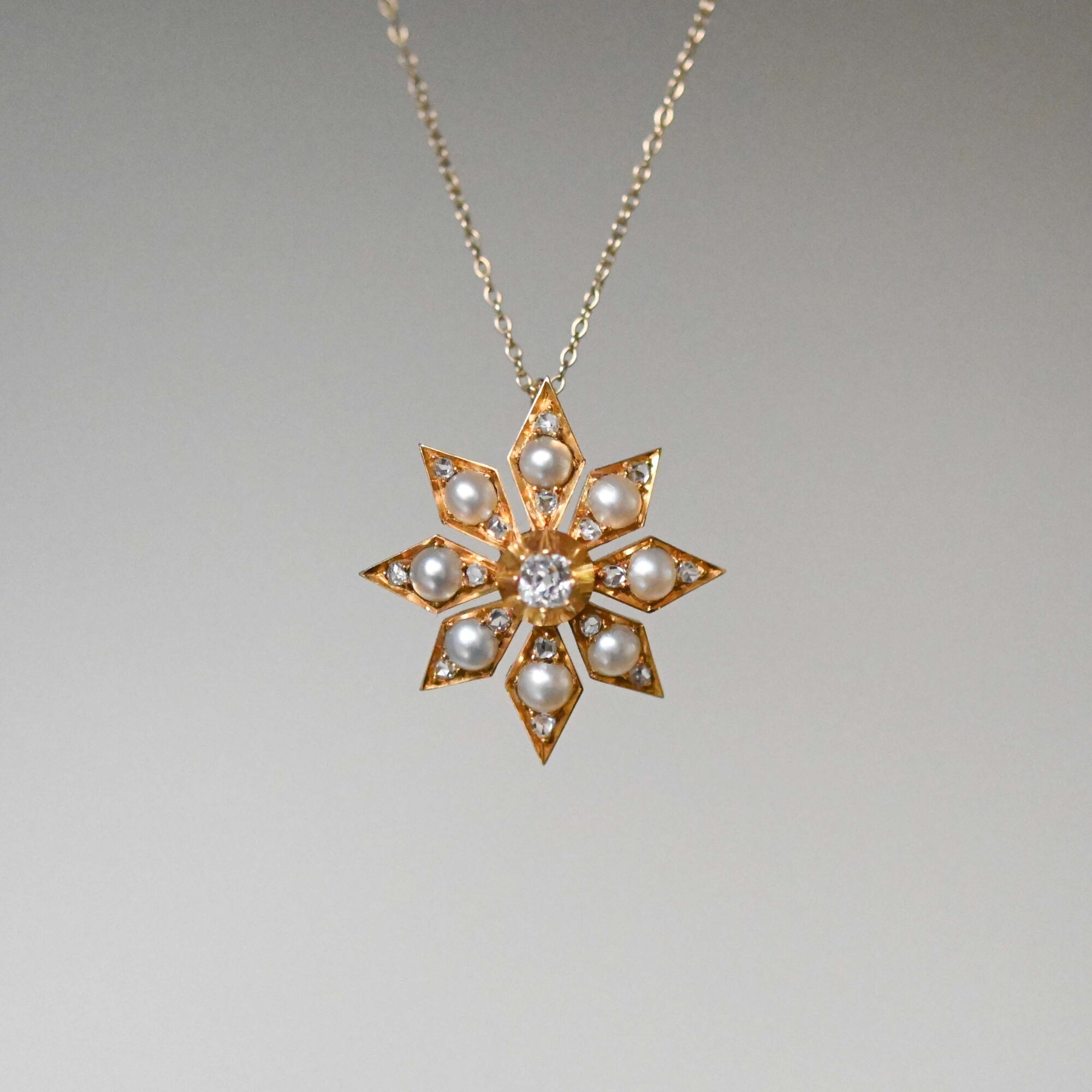 Aesthetic Victorian 18ct gold pearl and old cut diamond starburst pendant c.1860s