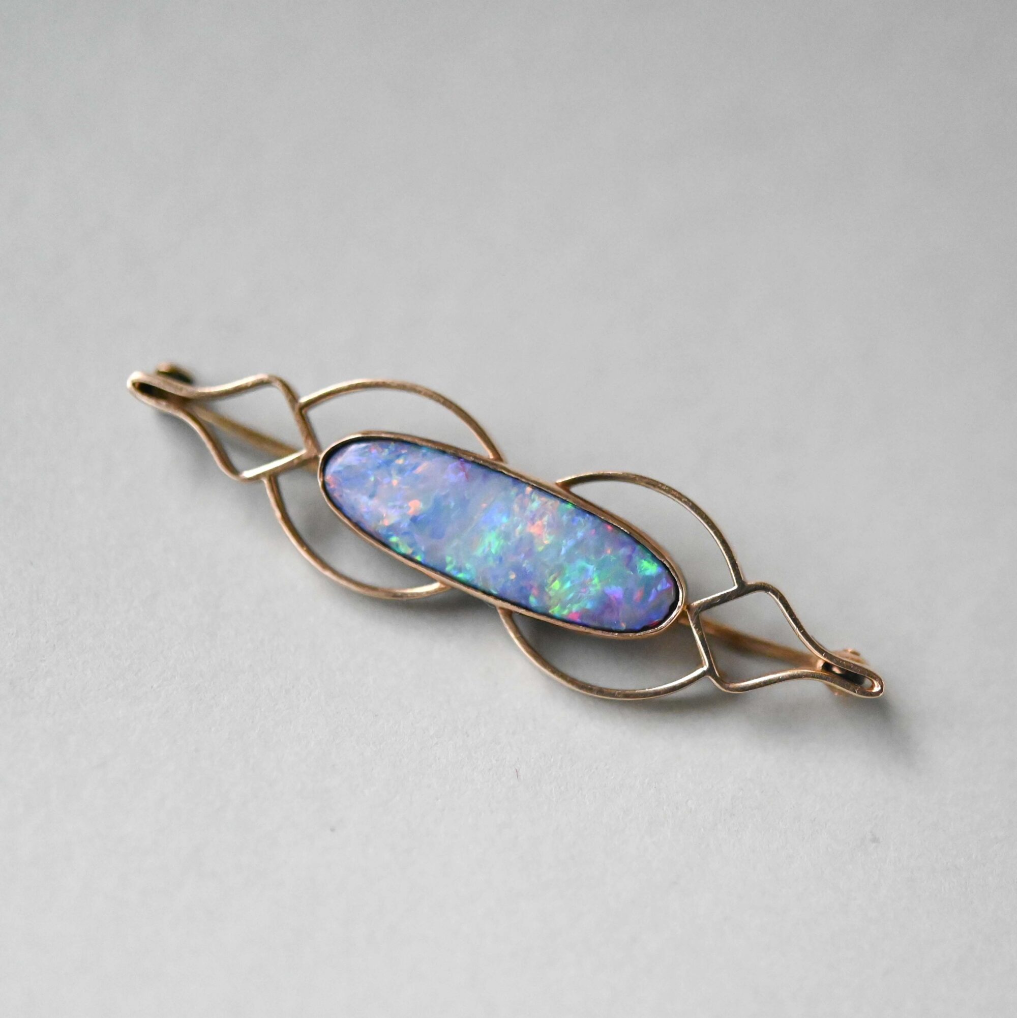 Aesthetic vintage 9ct gold fiery opal doublet brooch