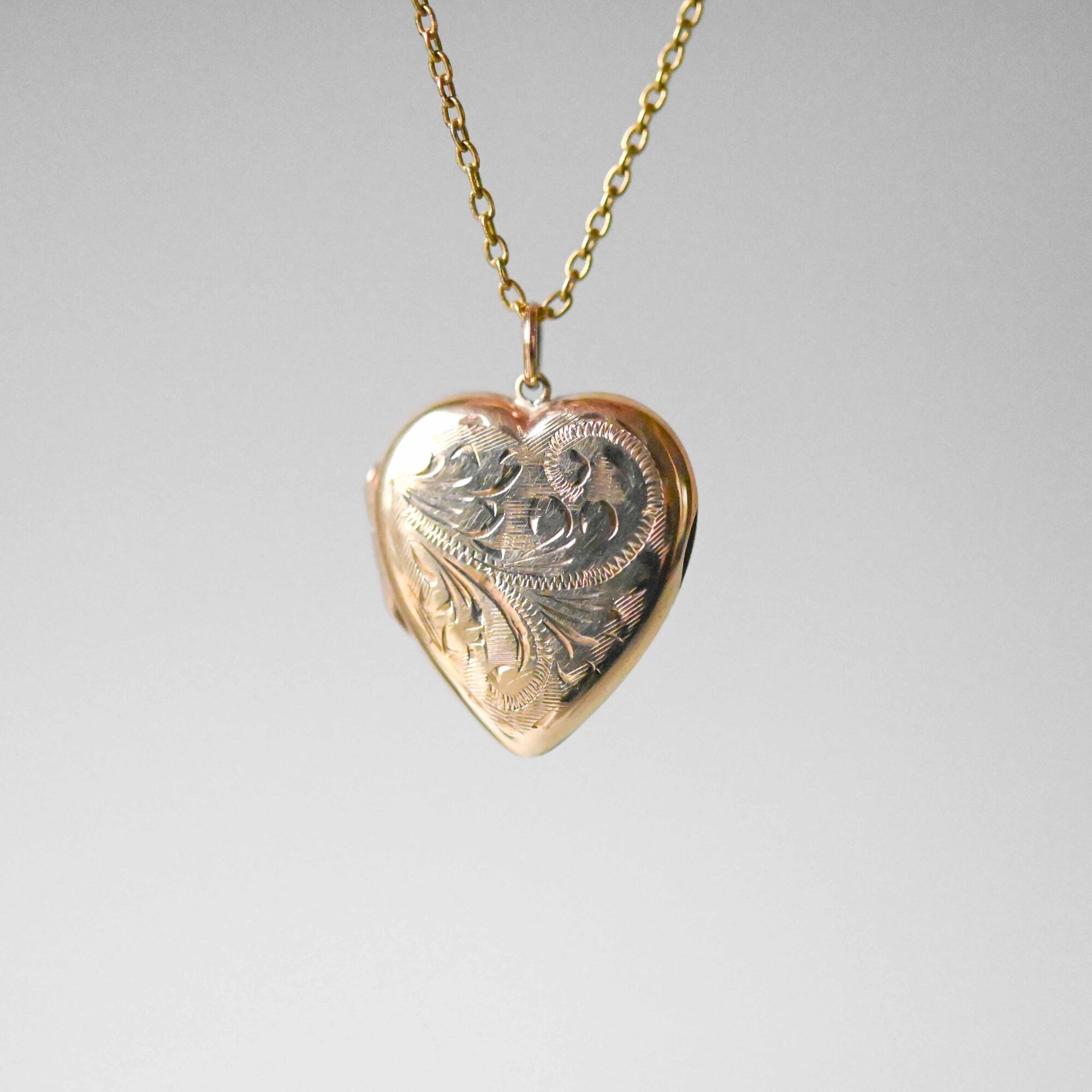 Engraved 9ct gold opening heart locket pendant