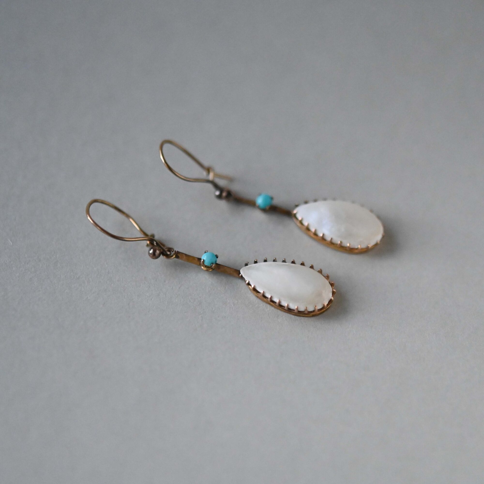 Aesthetic pair of Edwardian 9ct gold mother of pearl and turquoise paste drop earrings