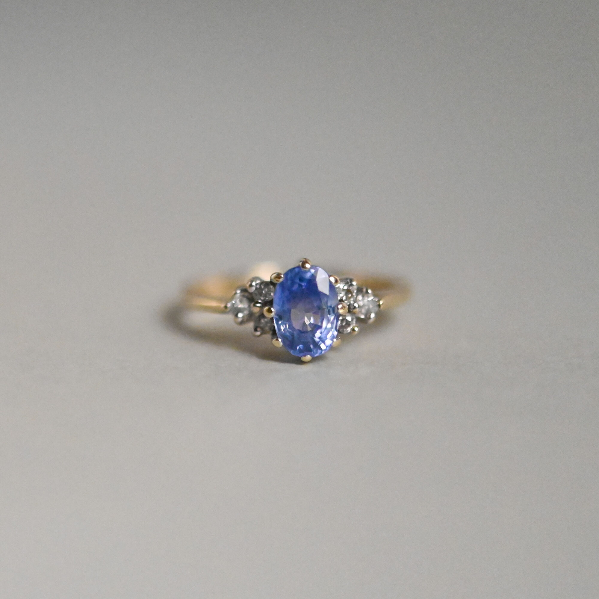 Classic cornflower sapphire and mini diamond 9ct gold ring