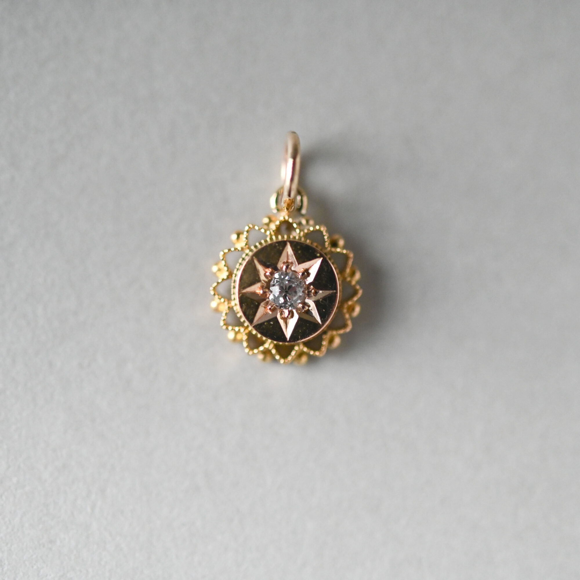 Cutie Antique Victorian 15ct gold diamond starburst charm