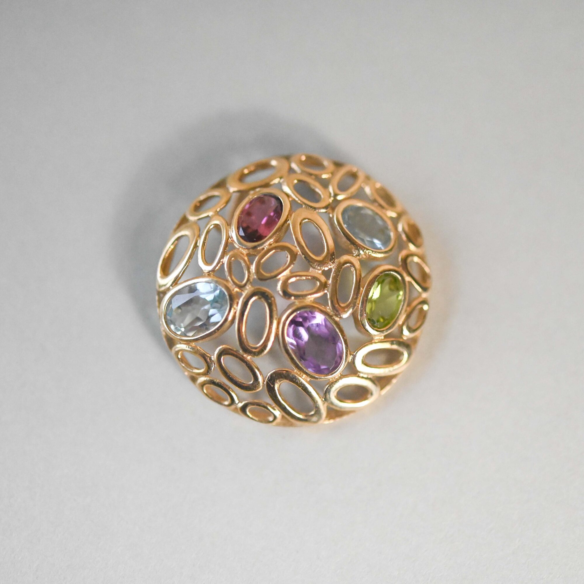 Aesthetic 9ct gold multi gemstone pendant with amethyst, peridot, topaz and tourmaline