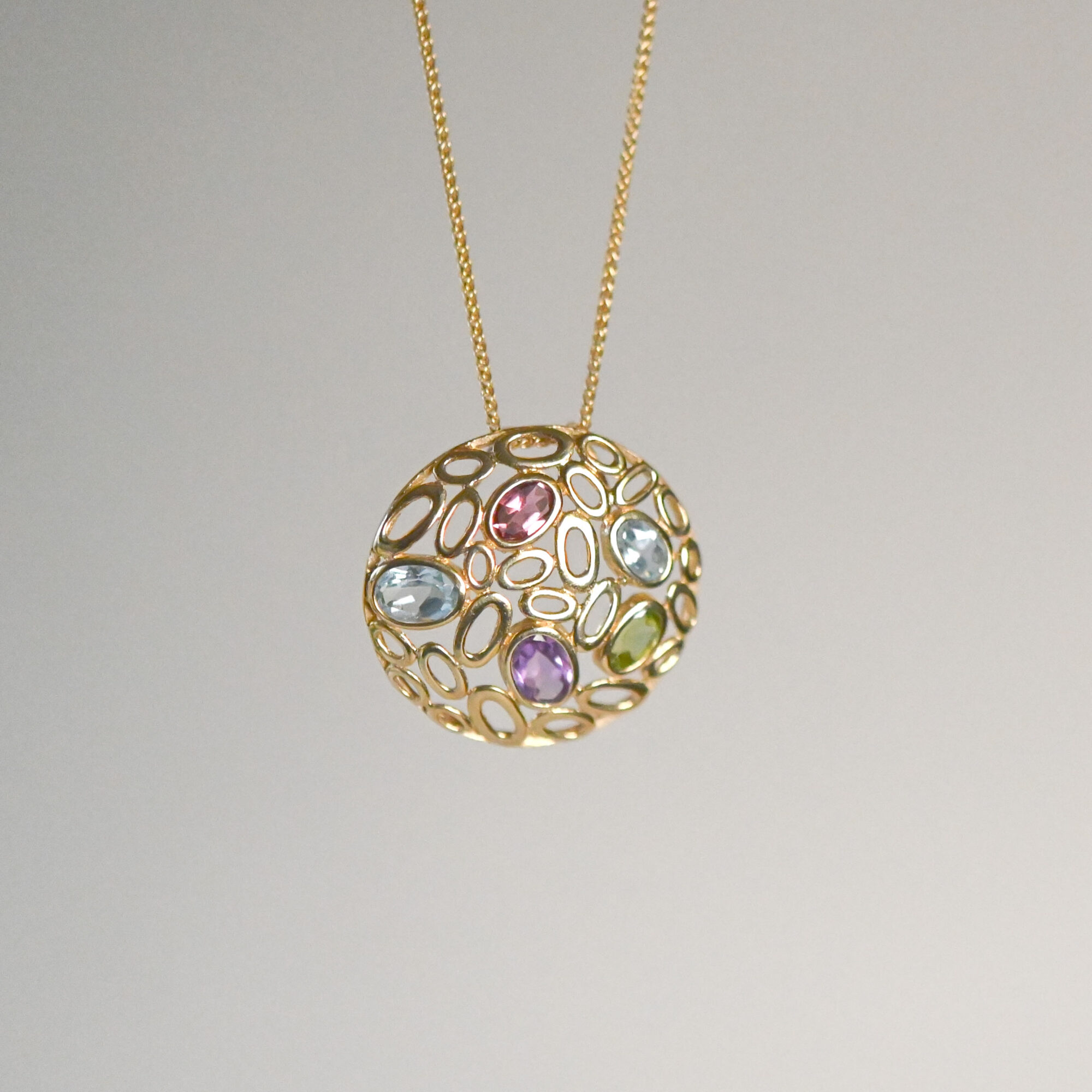 Aesthetic 9ct gold multi gemstone pendant with amethyst, peridot, topaz and tourmaline - Image 2