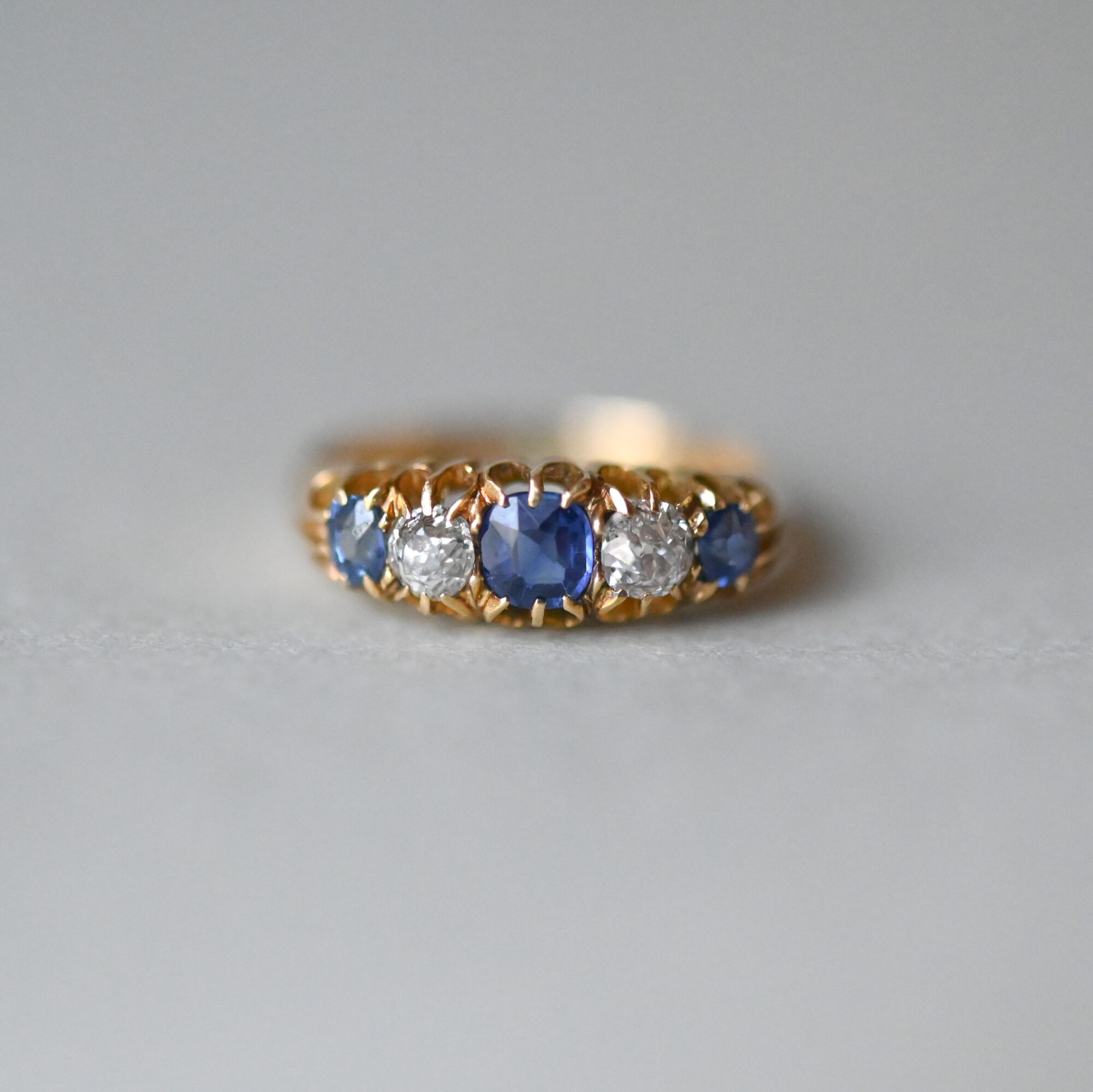 Antique 18ct gold old cut diamond and sapphire five stone ring