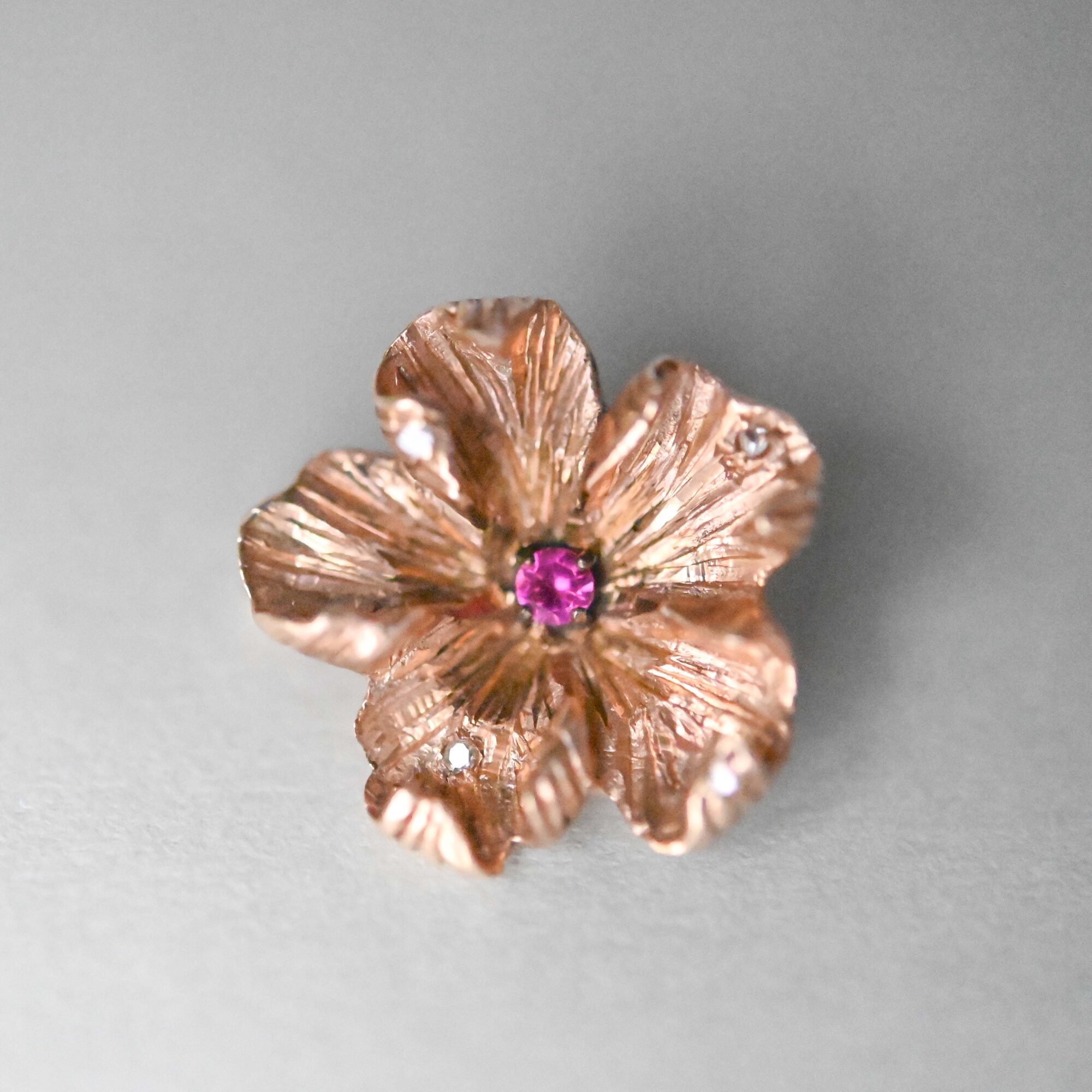 Bespoke 9ct gold ruby and mini diamond floral brooch