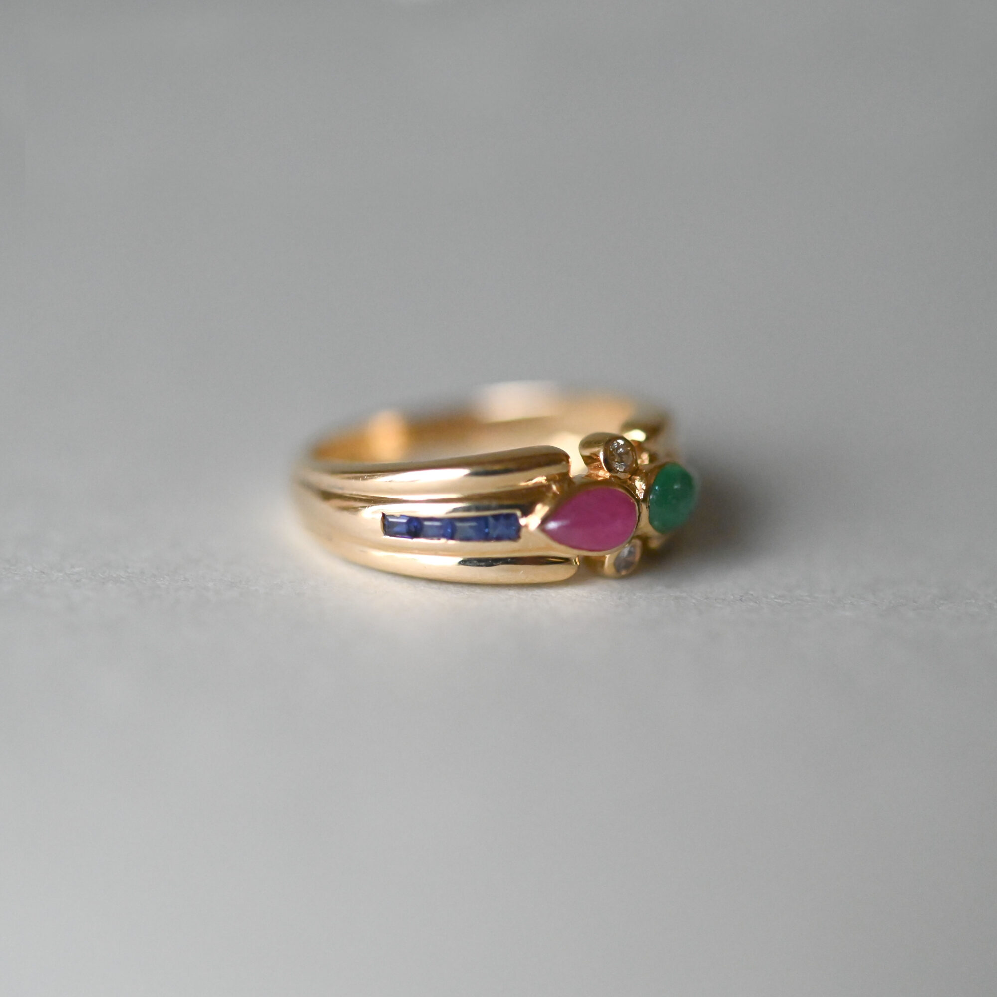 Contemporary 18ct gold emerald, sapphire, ruby and diamond aesthetic ring - Image 3