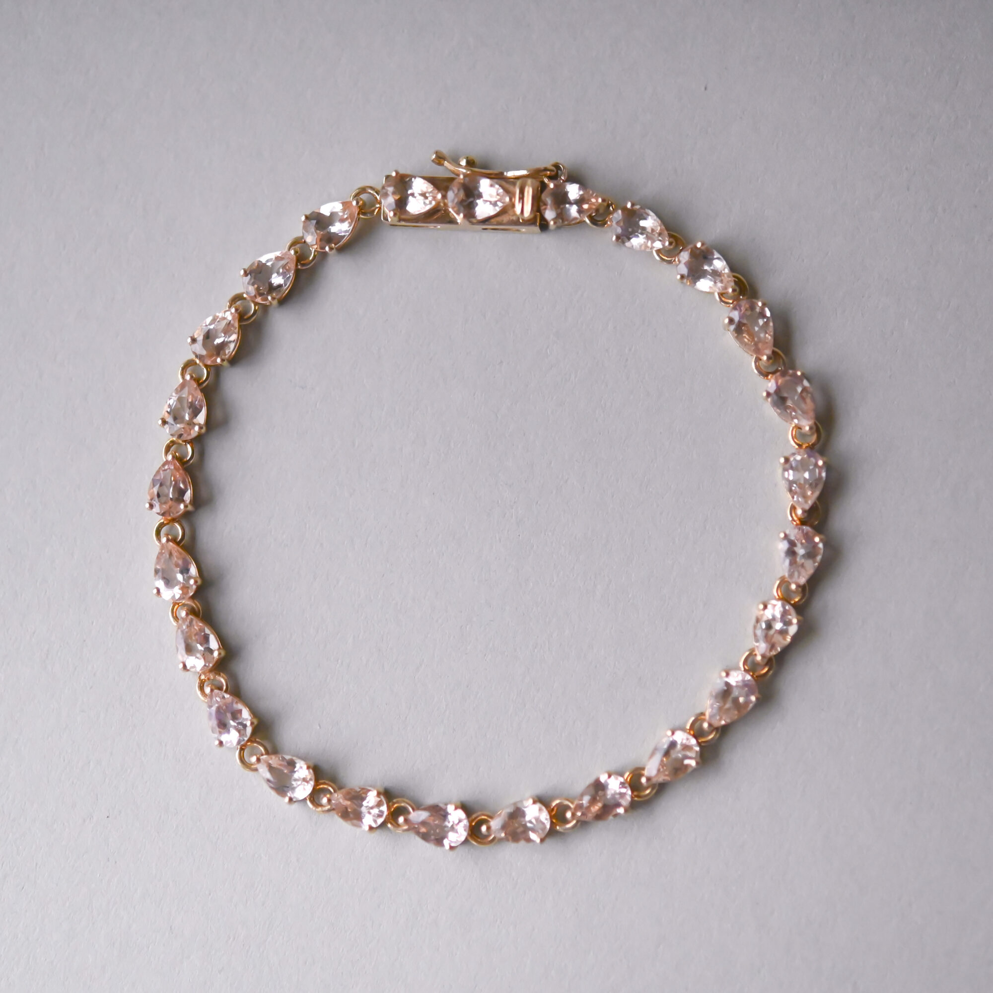 Contemporary 9ct gold light peach hue morganite tennis bracelet