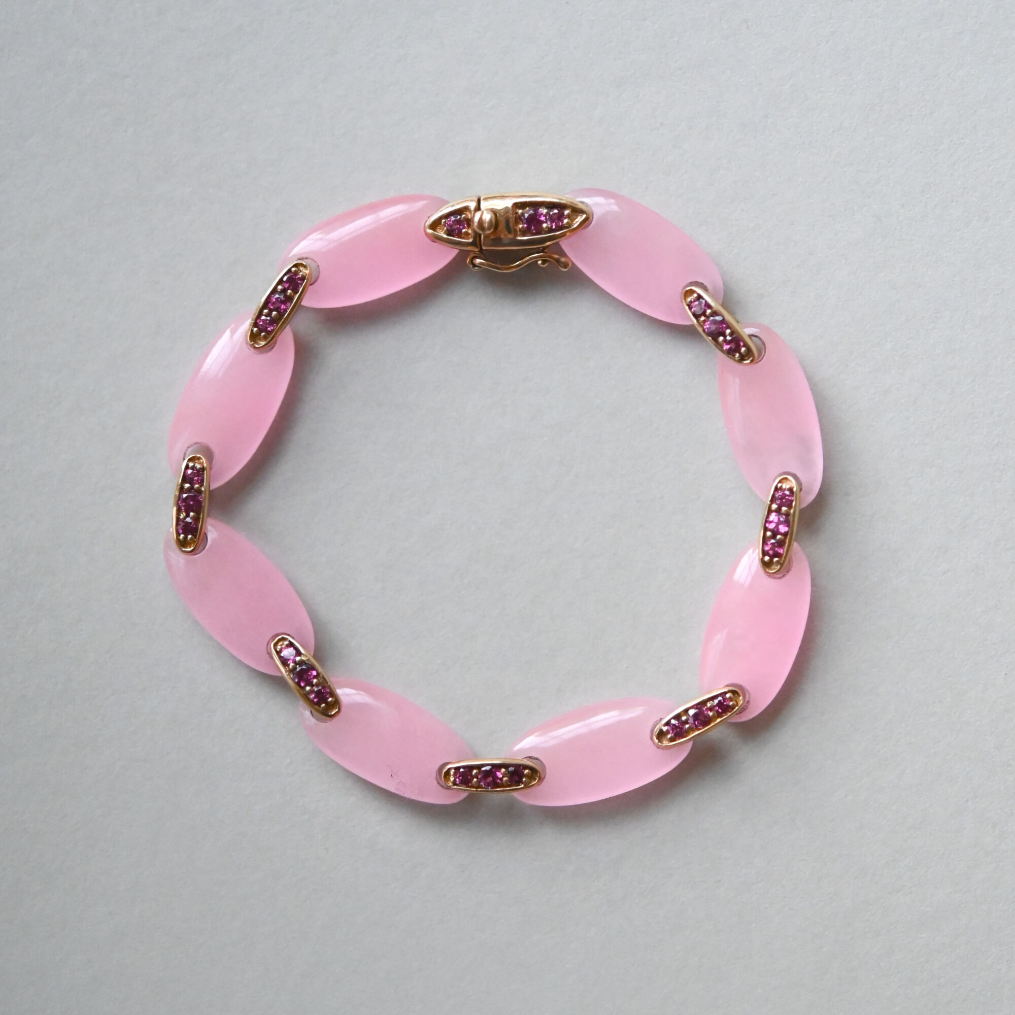 Contemporary 9ct gold rose quartz and pink tourmaline articulated bracelet