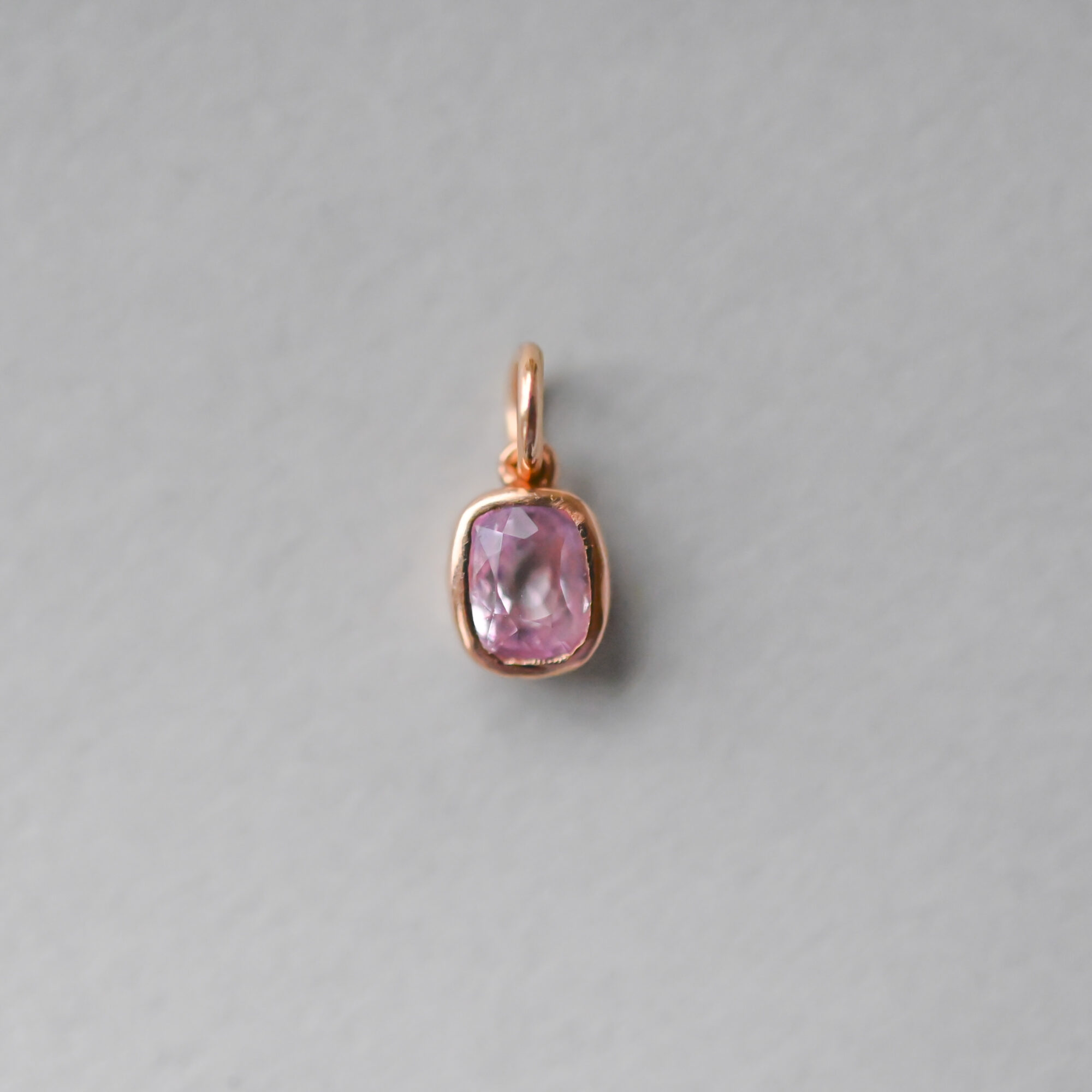 Dainty 18ct rose gold pink sapphire mini charm pendant