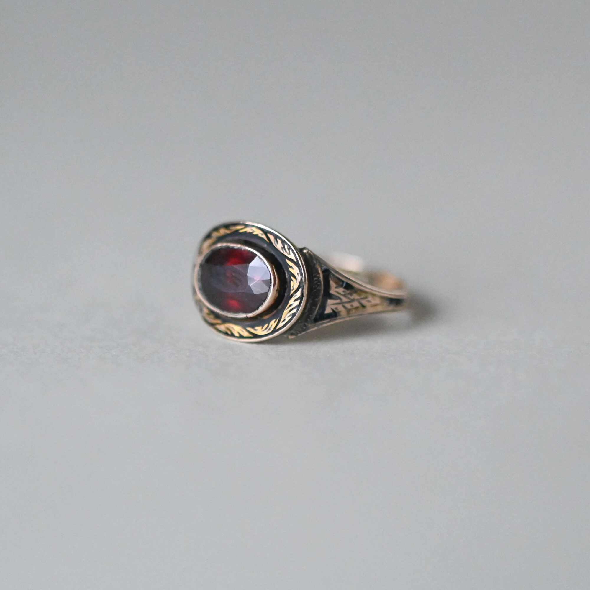 Early Victorian 9ct gold garnet and black enamel ring, c.1860s - Image 2