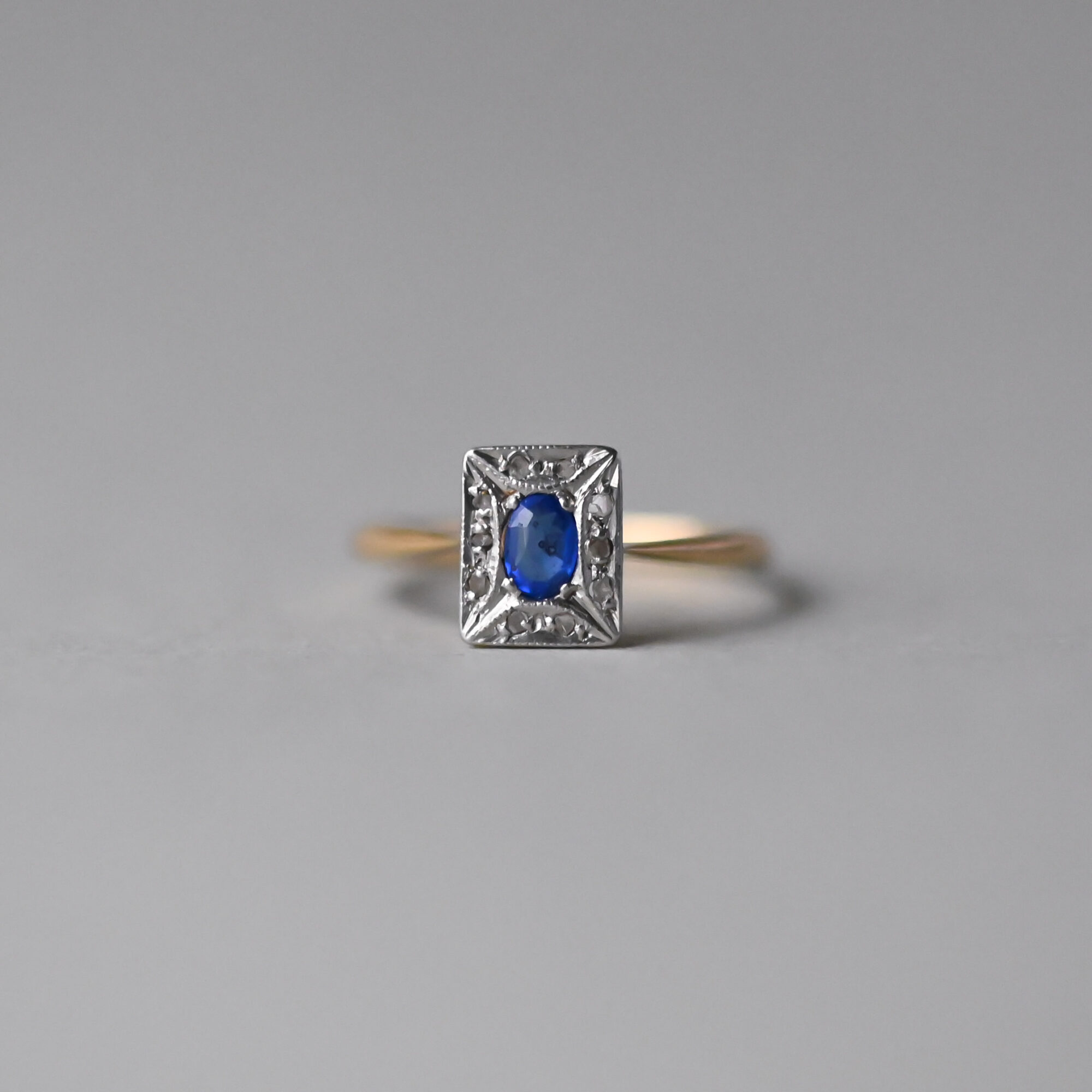 Edwardian 18ct gold and platinum sapphire and mini diamond cluster ring