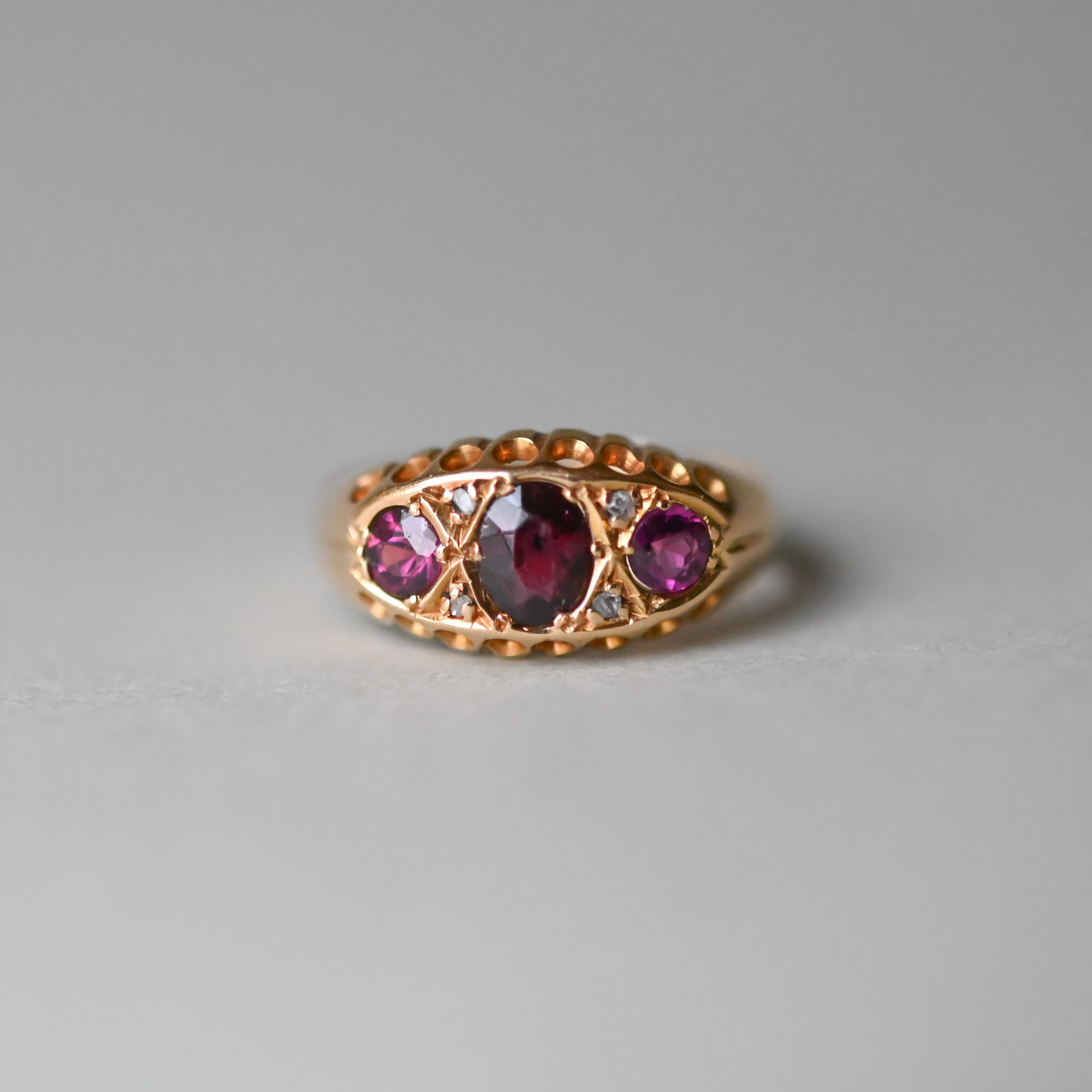 Late Victorian 18ct gold garnet and mini diamond boat ring