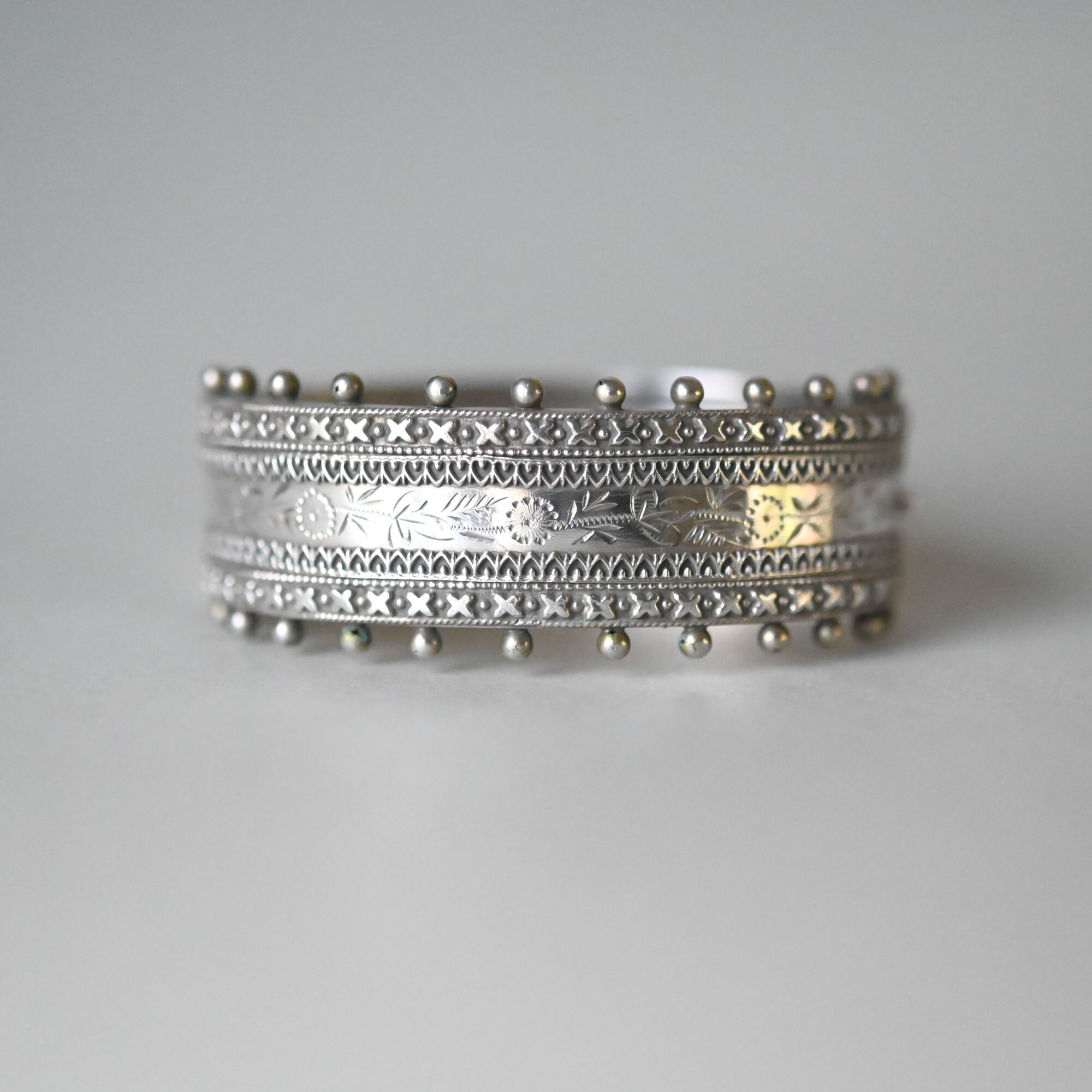 Victorian sterling silver engraved bracelet with beaded edge, 1885