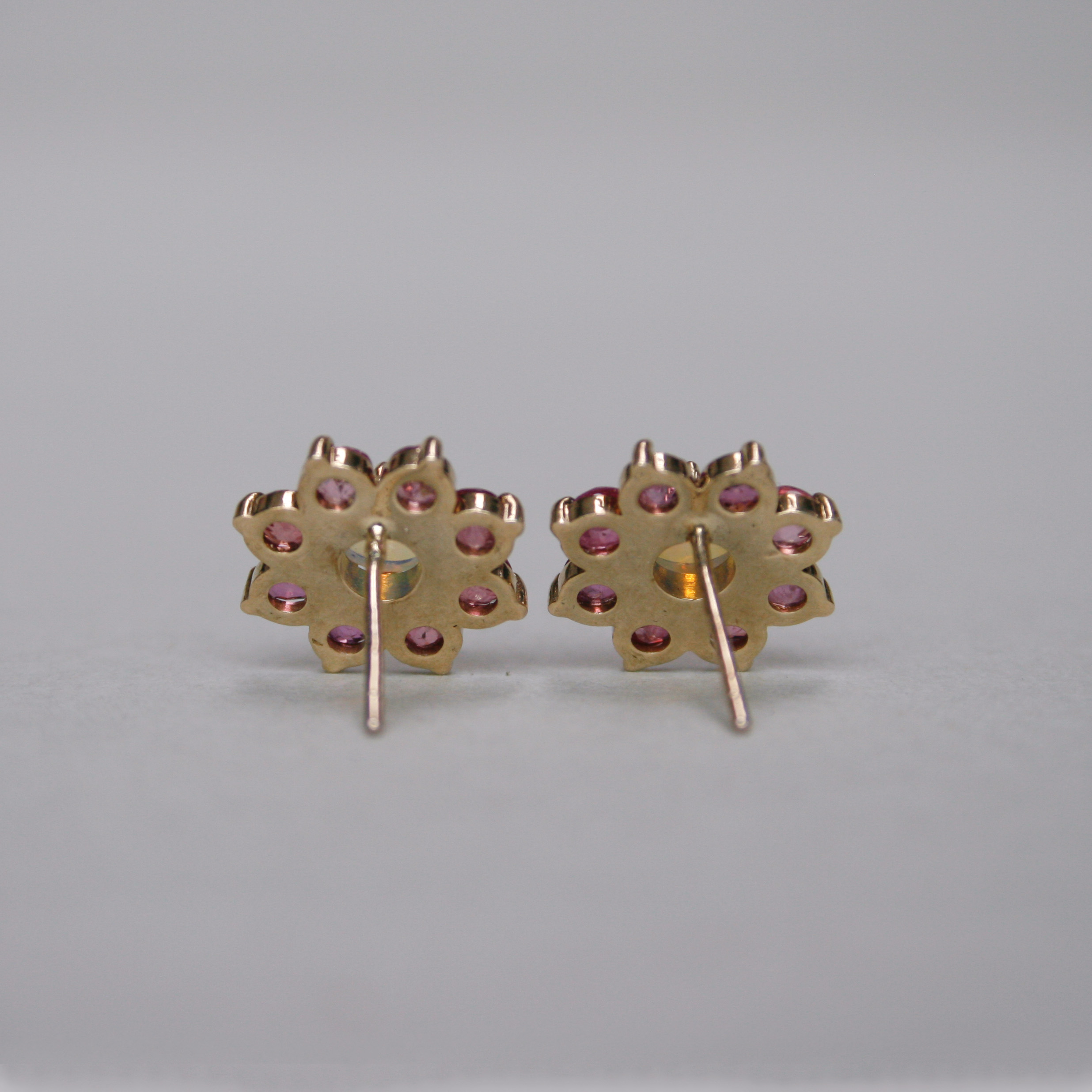 Contemporary pair of 9ct gold ruby and opal cluster earrings - Image 4