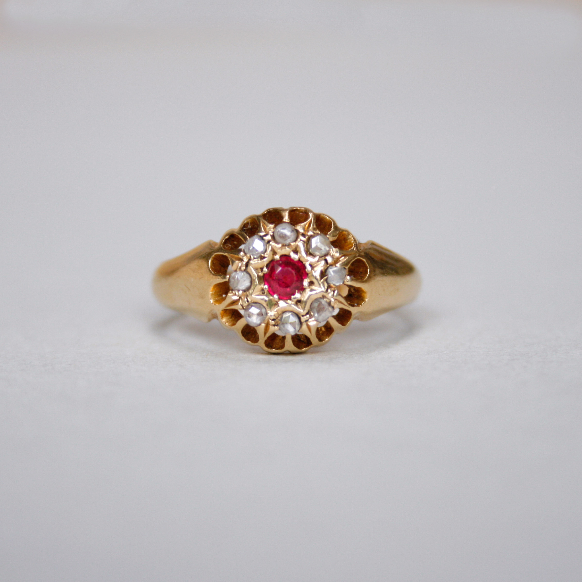 Antique 18ct gold ruby and rose cut diamond cluster ring, 1918