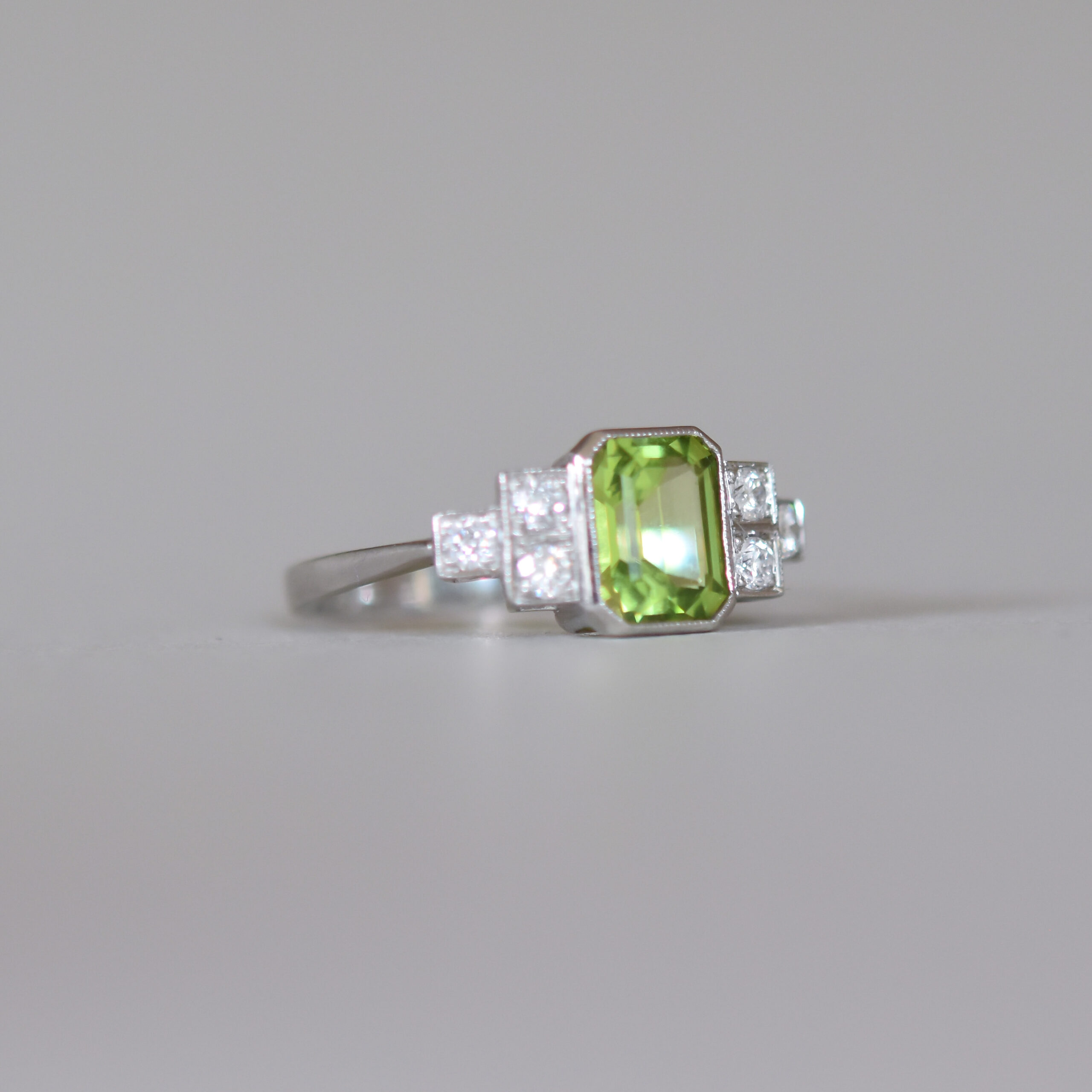 Contemporary Art Deco design peridot and diamond platinum ring - Image 2