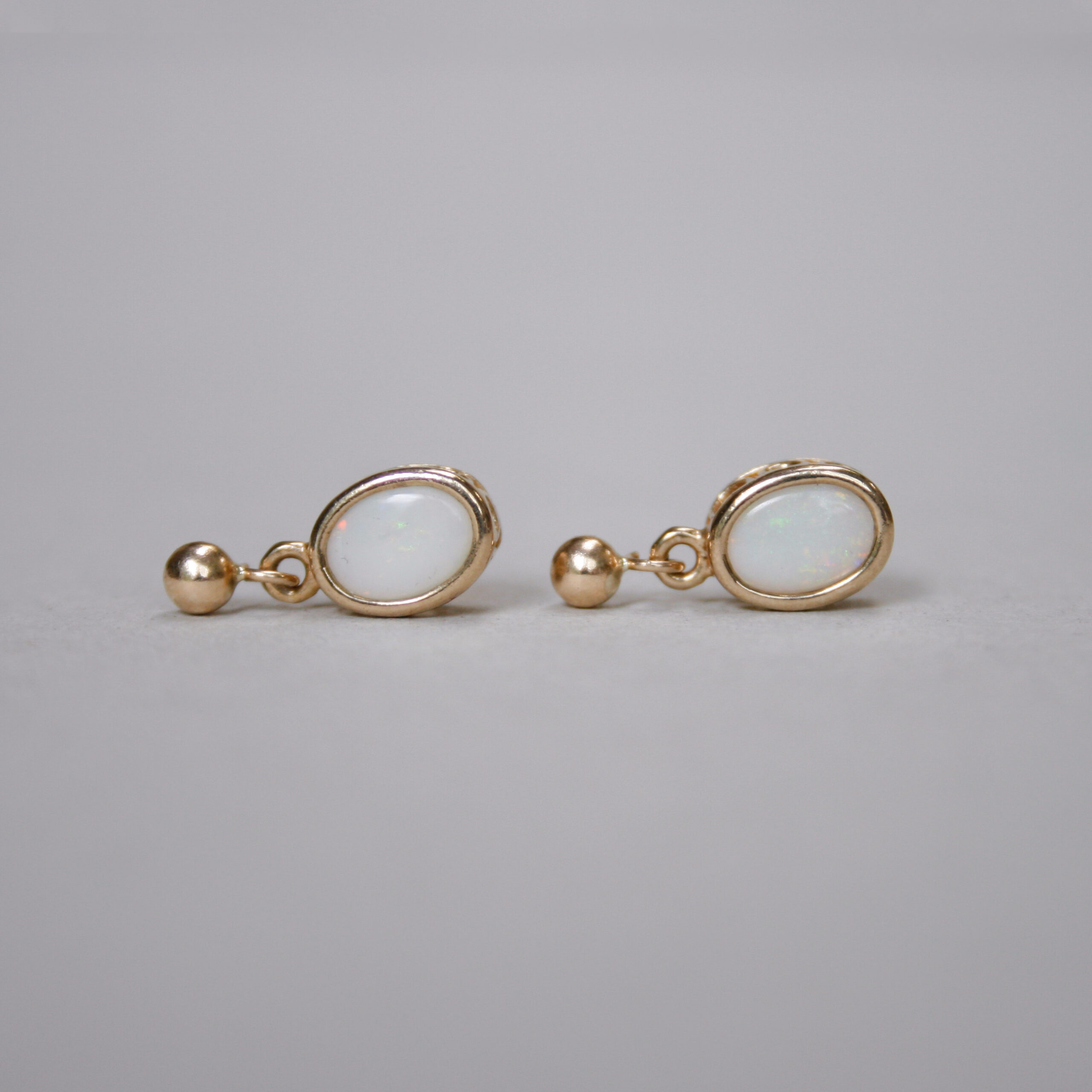 Classic pair of 9ct gold opal drop earrings