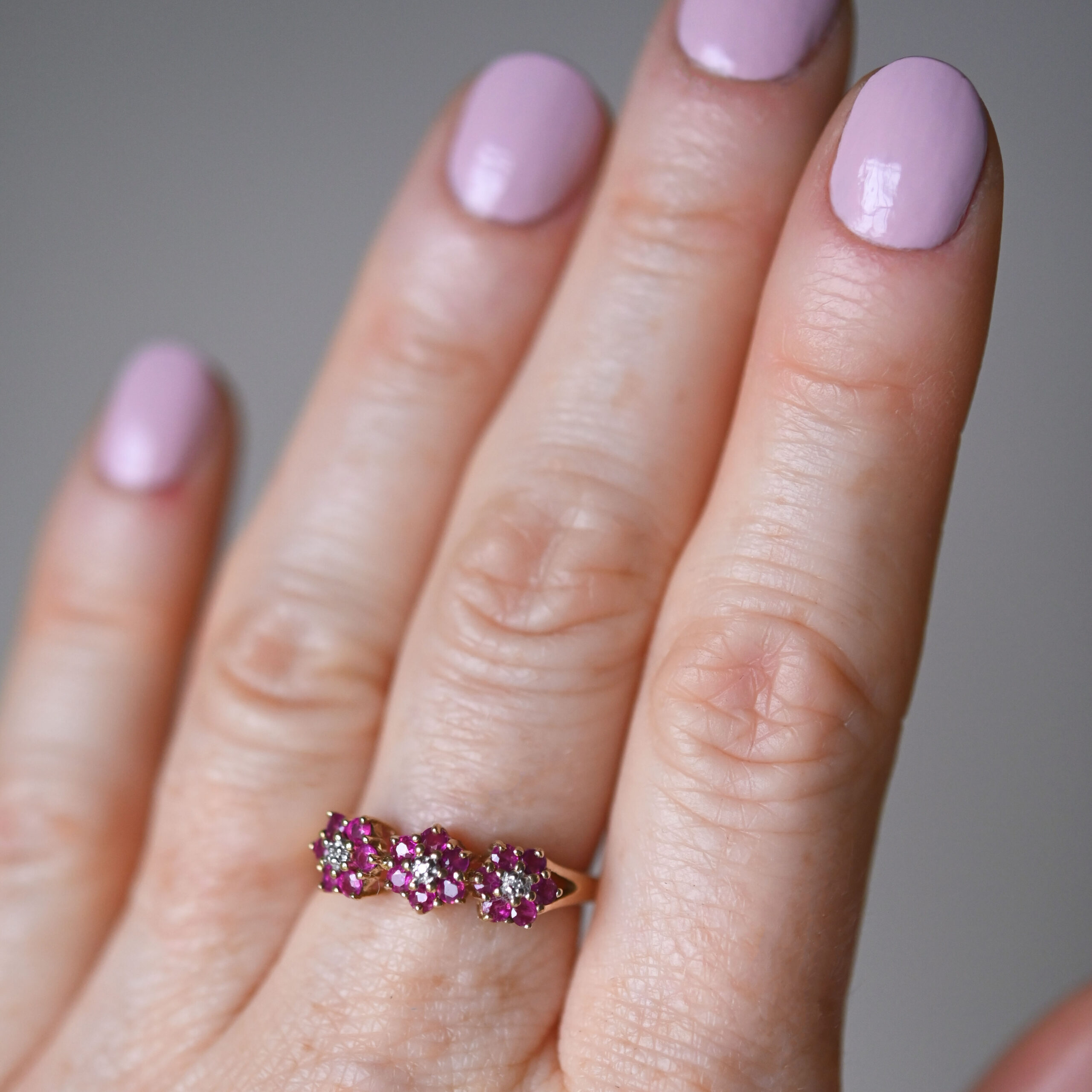 Contemporary 9ct gold ruby and mini diamond triple cluster ring - Image 2