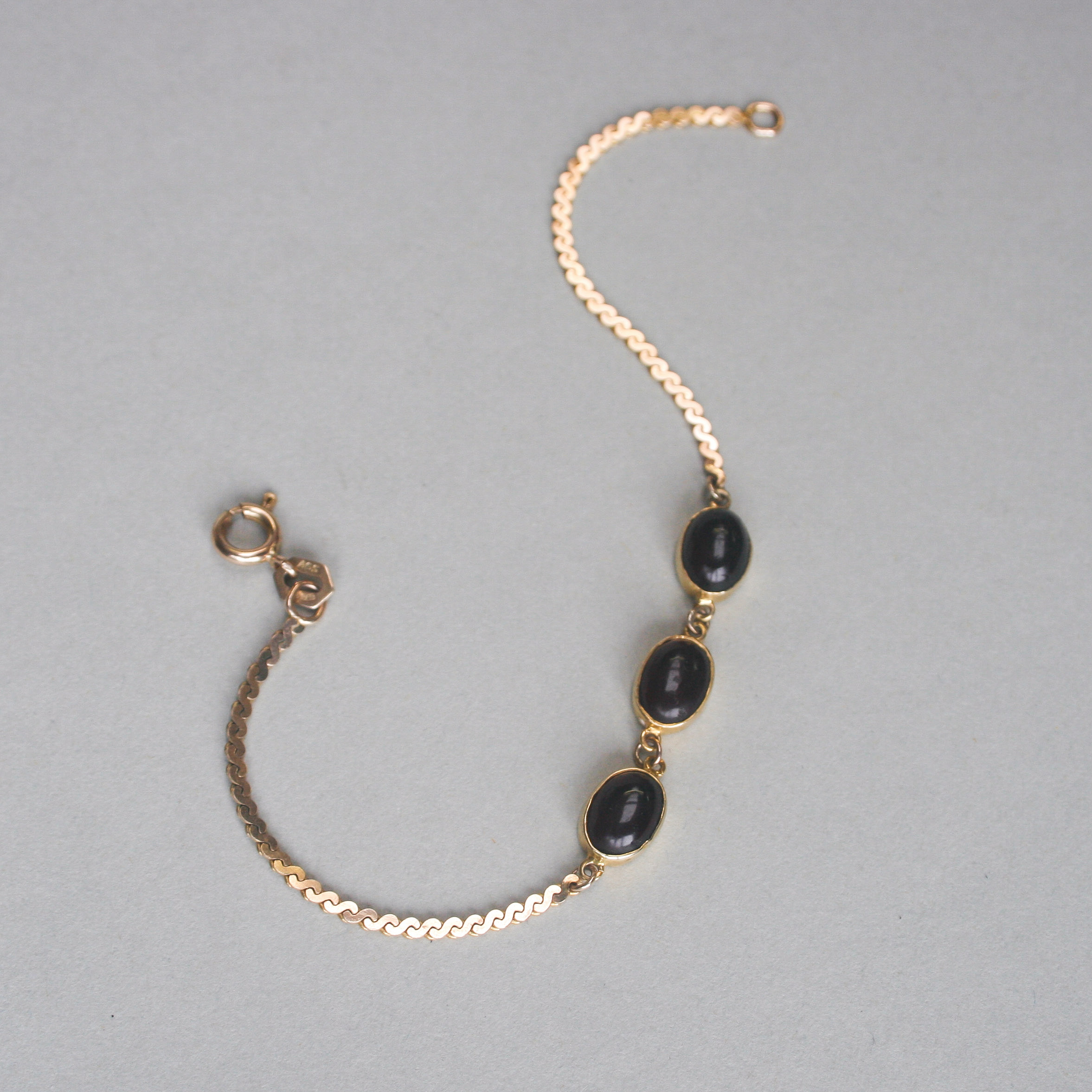 Dainty 9ct gold red paste cabochon bracelet