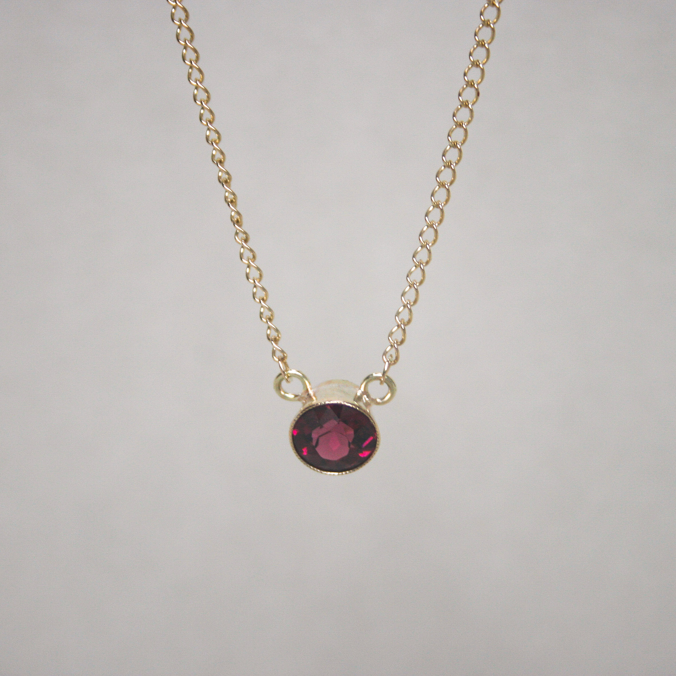 Cutie contemporary 9ct gold garnet conversion necklace