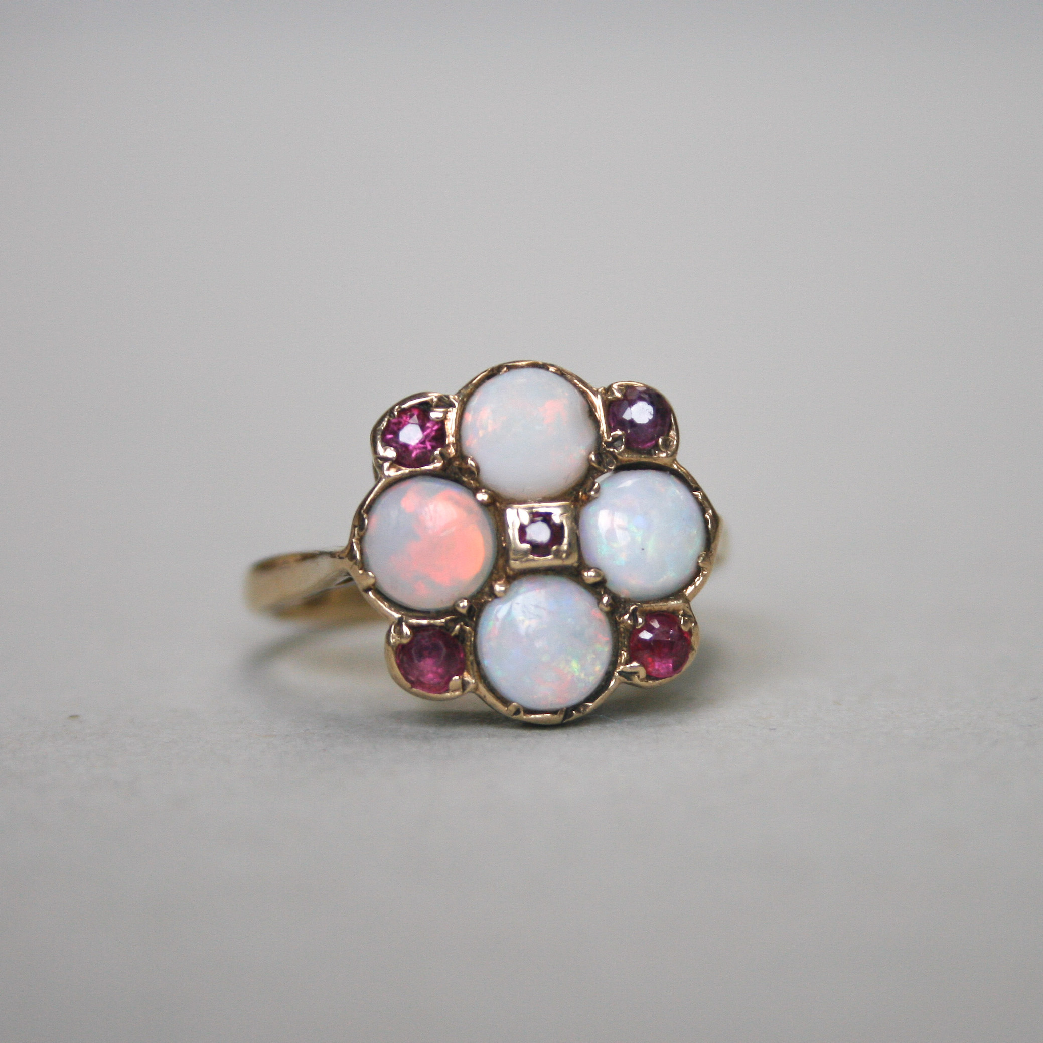 SOLD *Contemporary 9ct gold opal and ruby quatrefoil ring* - Image 2