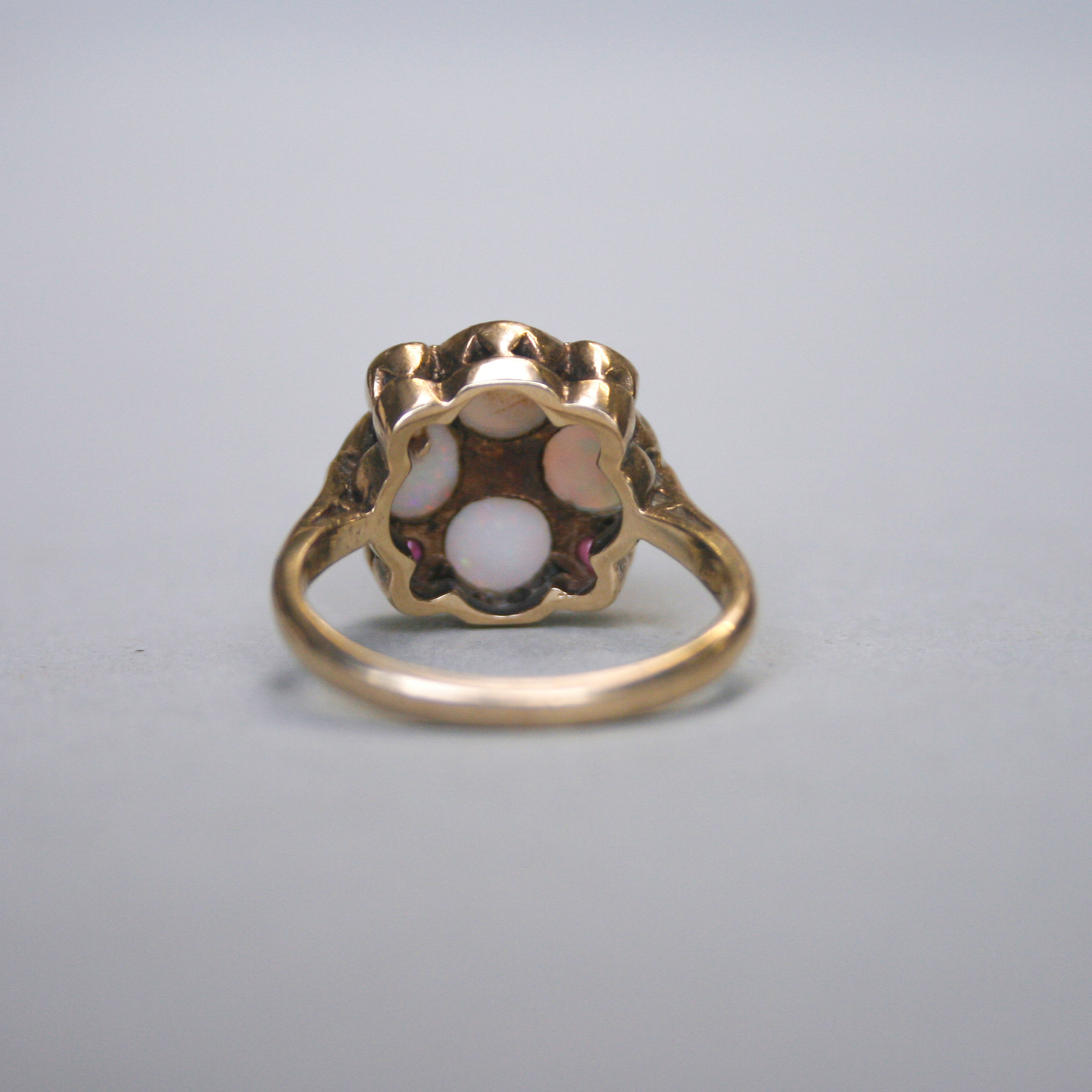 SOLD *Contemporary 9ct gold opal and ruby quatrefoil ring* - Image 3