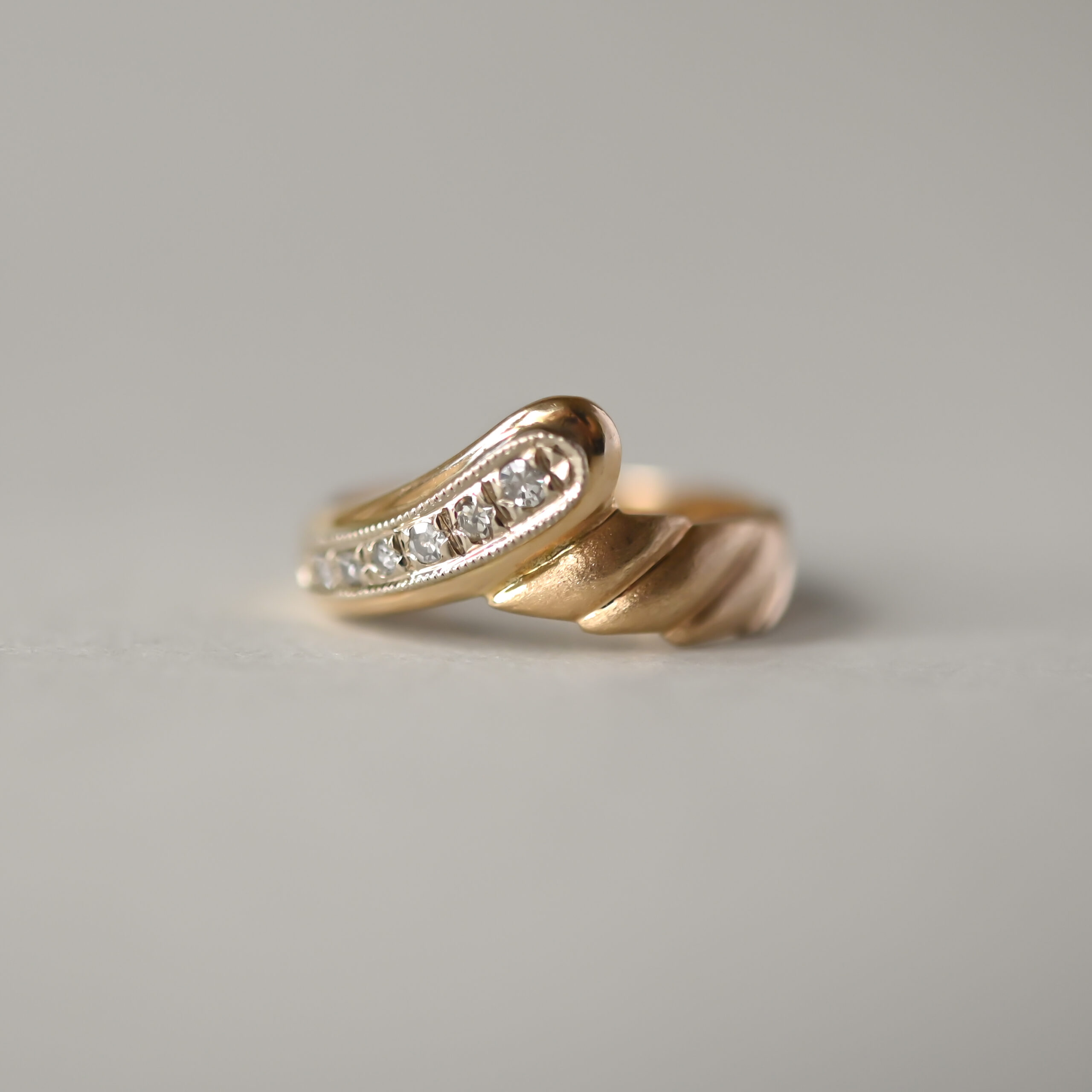 Aesthetic 14ct gold diamond snake twist ring