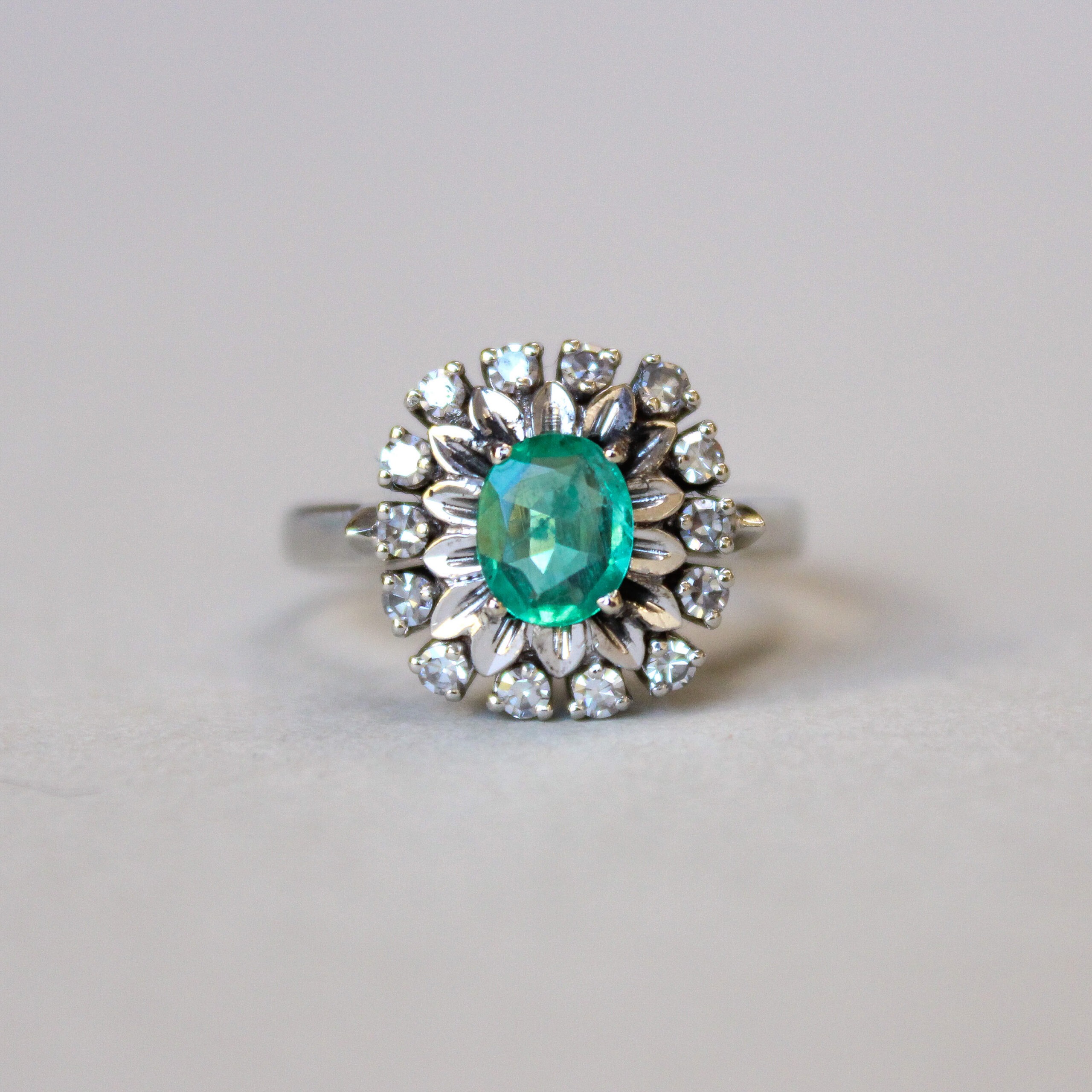 SOLD *Aesthetic 18ct white gold emerald and diamond cluster ring c.1960s