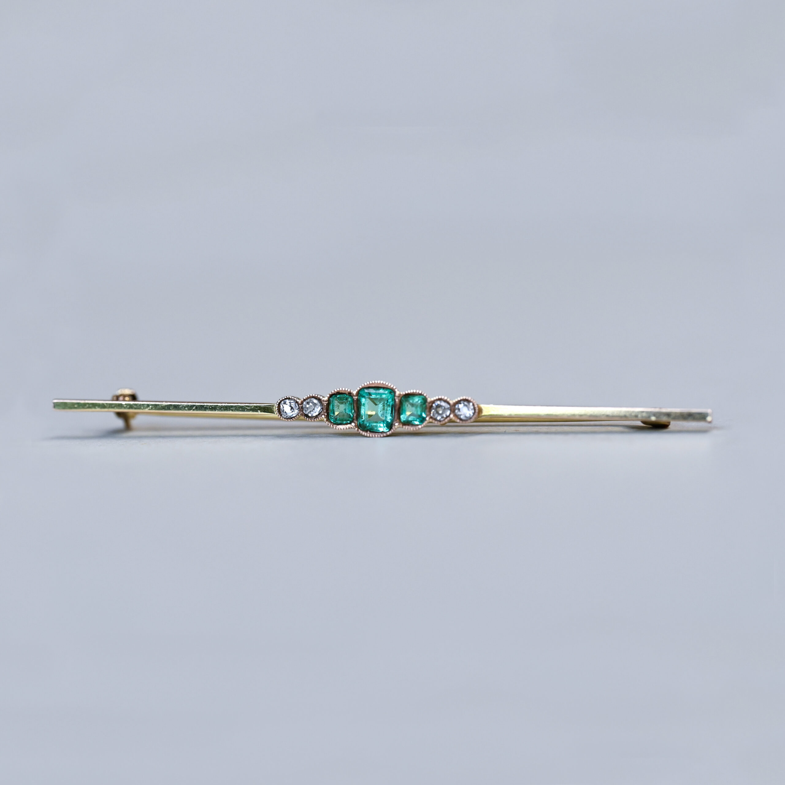 Emerald and diamond bar brooch pin