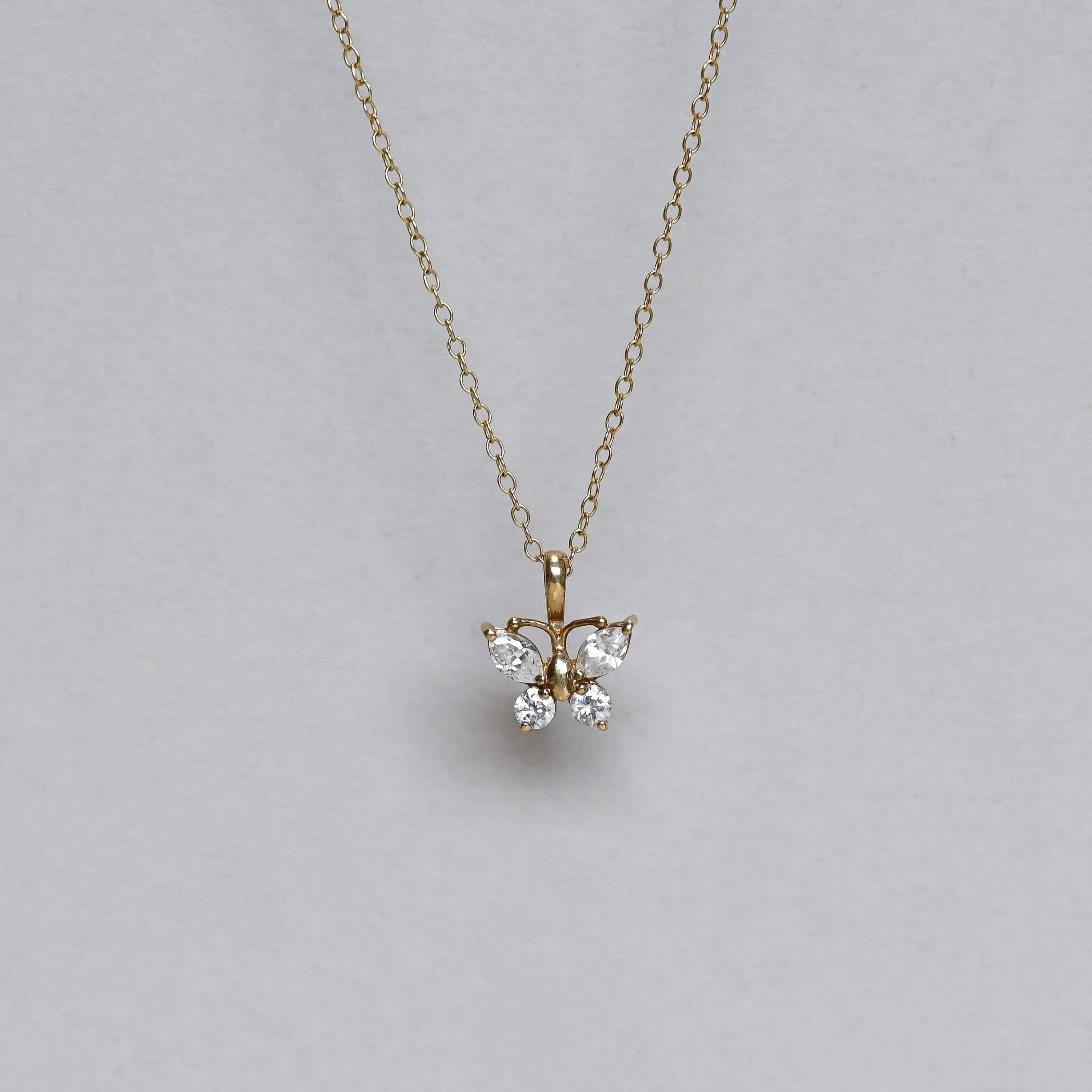 Contemporary 9ct gold paste cutie butterfly charm