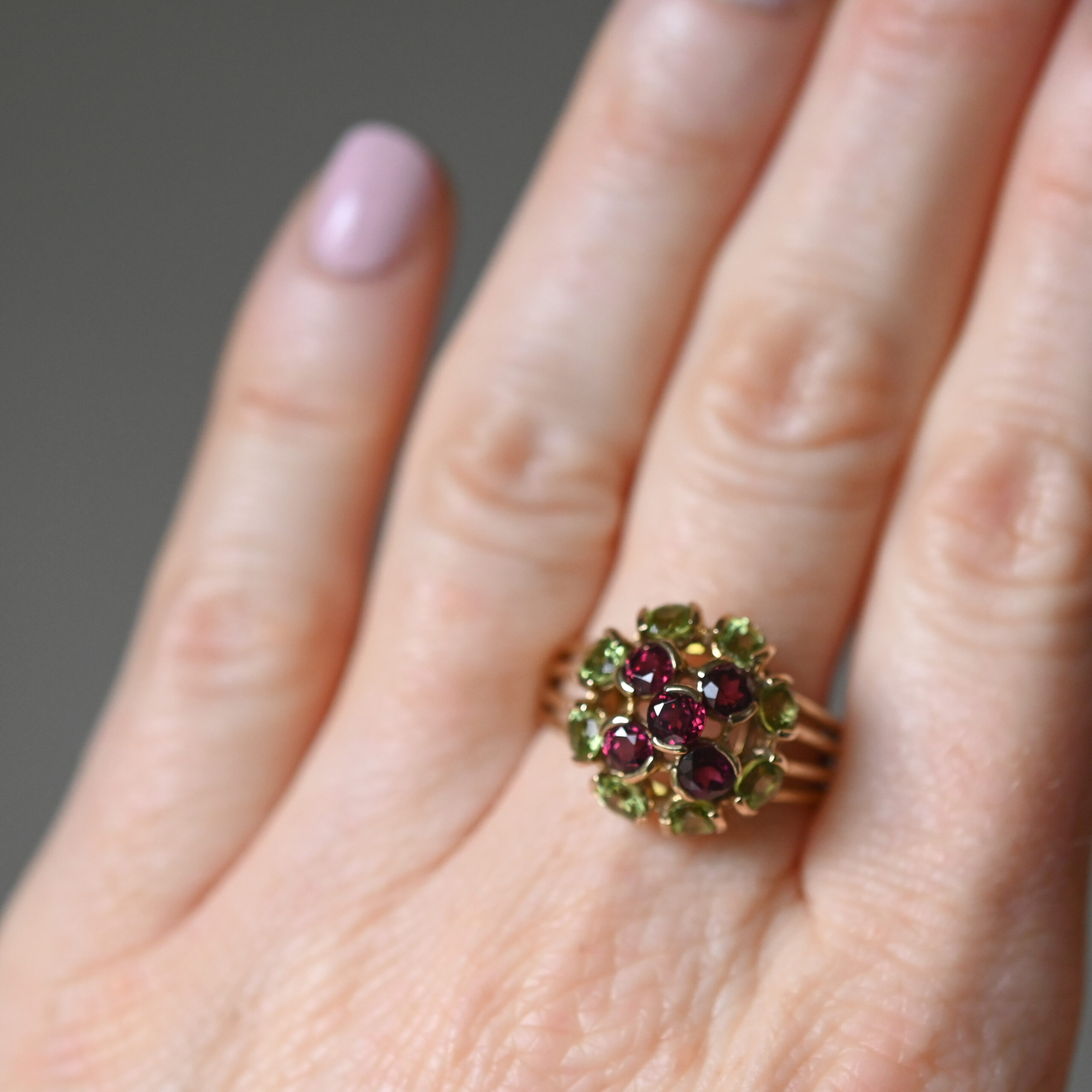 Contemporary 9ct gold peridot and garnet floral cluster ring - Image 4